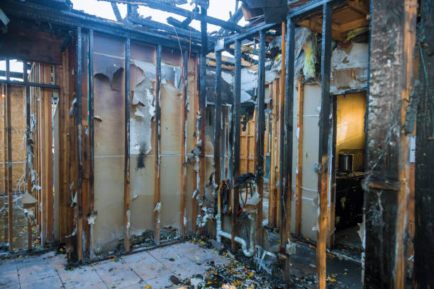 Professional Emergency Fire Damage Restoration technician working in Arlington, OH